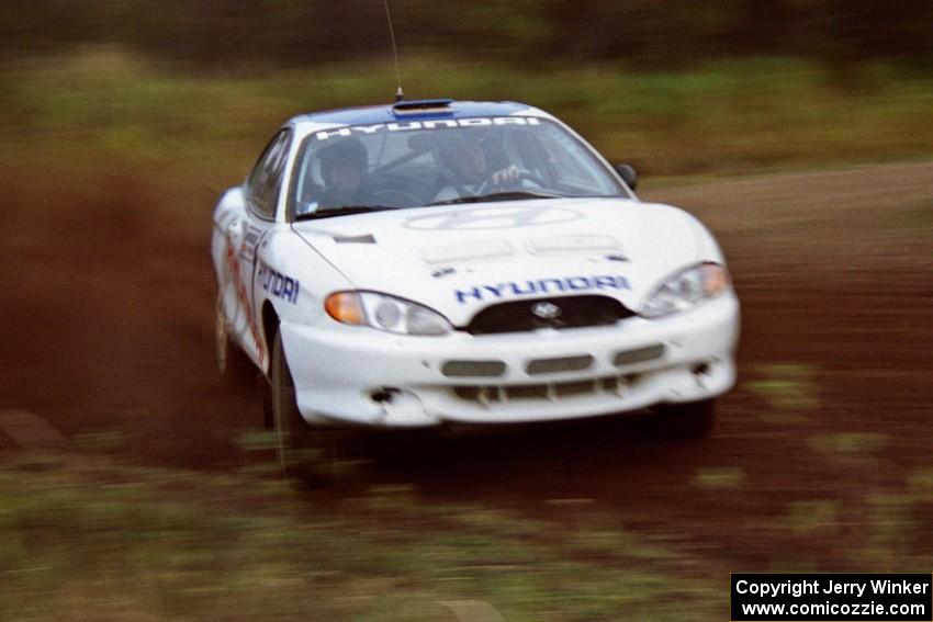 Paul Choiniere / Tom Grimshaw drift by in their Hyundai Tiburon on the practice stage.