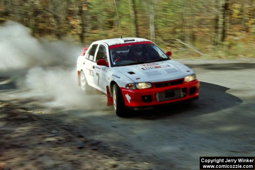 The Henry Joy IV / Michael Fennell Mitsubishi Lancer Evo II near the end of an early morning stage.