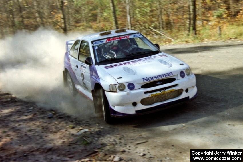 The Carl Merrill / Lance Smith Ford Escort Cosworth RS near the end of a stage in the early morning.