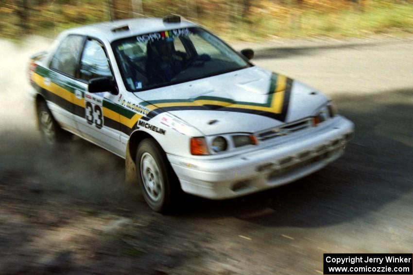 Tom Ottey / Pam McGarvey drift their Hyundai Elantra through the final corner of SS2.