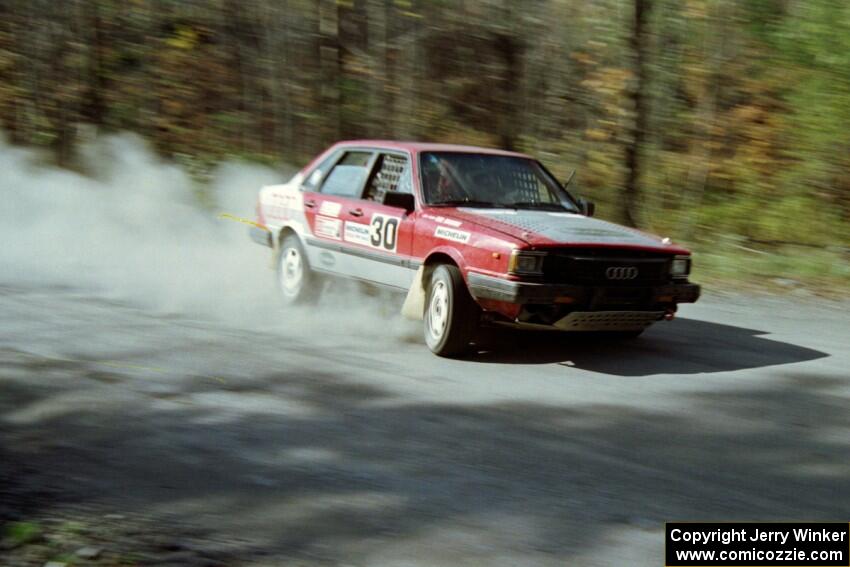 Jon Kemp / Gail McGuire drift their Audi 4000 Quattro through the final sweeper before the finish of SS2.