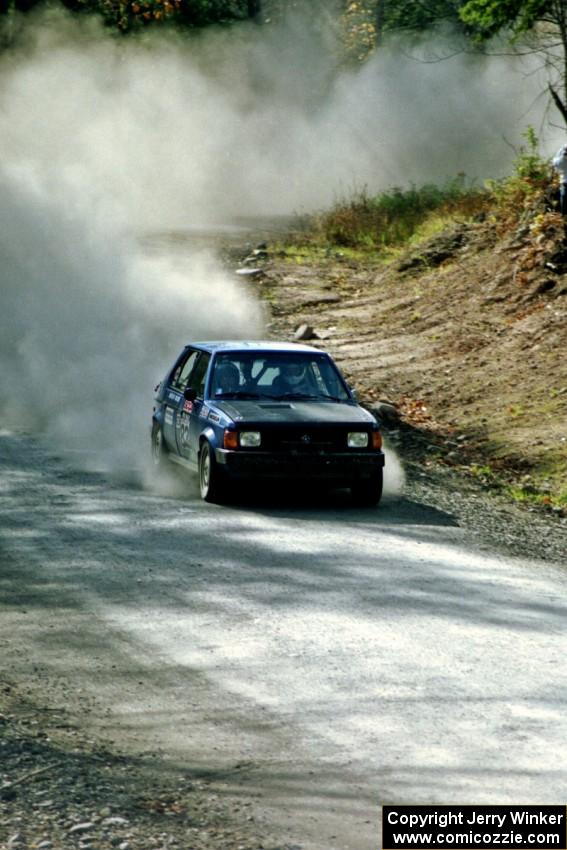 Mark Utecht / Paul Schwerin drift their Dodge Omni GLH-Turbo through one of the final corners of SS2.