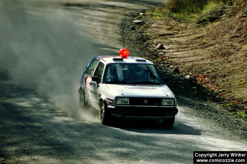 Eric Burmeister / Mark Buskirk come into the final sweeper of SS2 in their VW GTI.