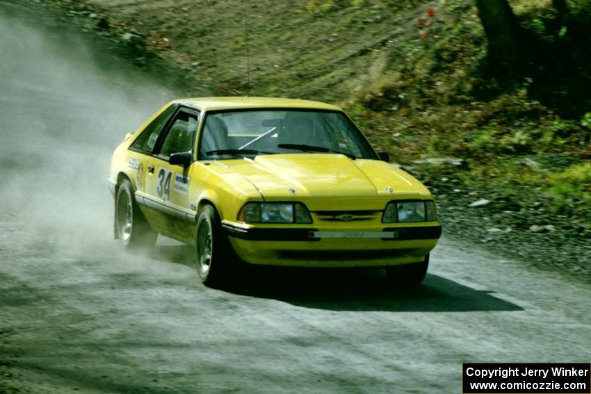 Don Rathgeber / Russ Rathgeber enter into the final corner of SS2 in their Ford Mustang.