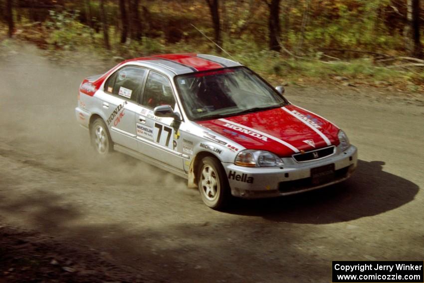 The Brian Shanfeld / Bryan Hourt Honda Civic drifts through the final corner on SS2.