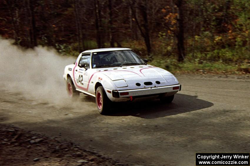 Craig Kazmierczak / Diane Sargent drift their Mazda RX-7 through the final corner of SS2.