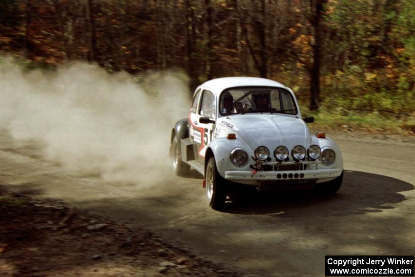 The Mike Villemure / Reny Villemure VW Beetle drifts through the final corner of SS2.