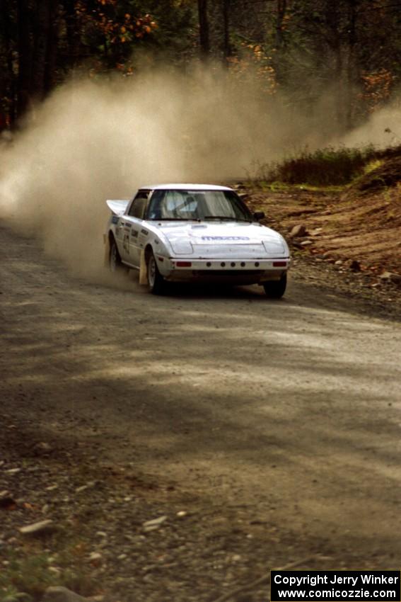 Ted Grzelak / Dan Gildersleeve drift their Mazda RX-7 through a corner near the end of SS2.