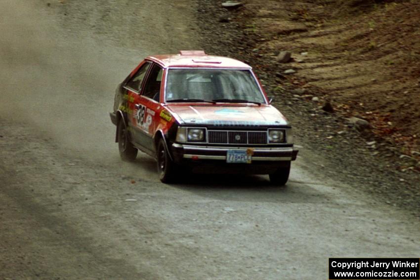 Jim Buchwitz / C.O. Rudstrom drift their Mercury Lynx through a sweeper near the end of SS2.