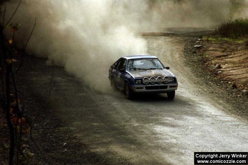 The Brian Scott / David Watts Dodge Shelby Charger drifts through the final corners of SS2.