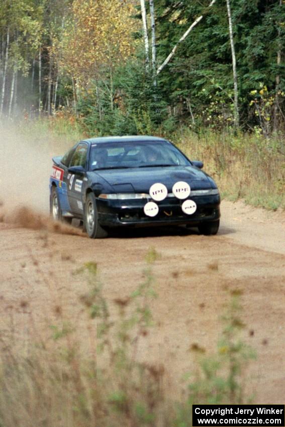 Cal Landau / Eric Marcus accelerate away from the start of Menge Creek I in their Mitsubishi Eclipse GSX.
