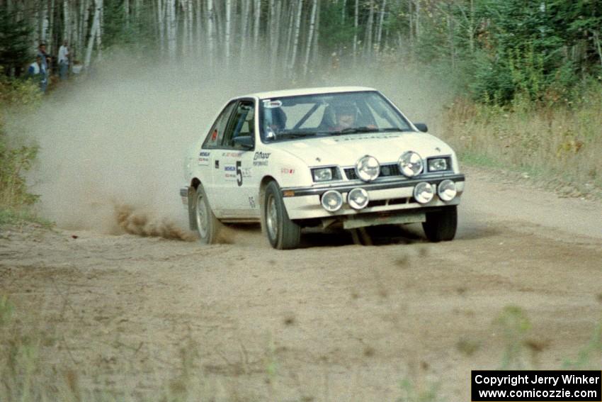 Henry Krolikowski / Cindy Krolikowski blast their Dodge Shadow down a straight near the start of Menge Creek I.