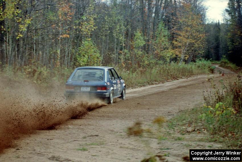 Mark Utecht / Paul Schwerin throw gravel in their Dodge Omni GLH-Turbo near the start of Menge Creek I.
