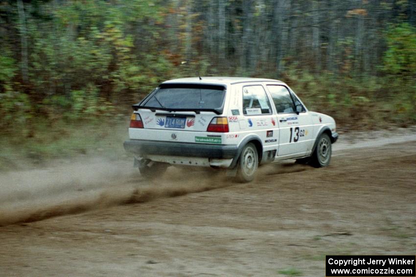 Wayne Prochaska / Annette Prochaska bring their VW Golf through the first corner of Menge Creek I.