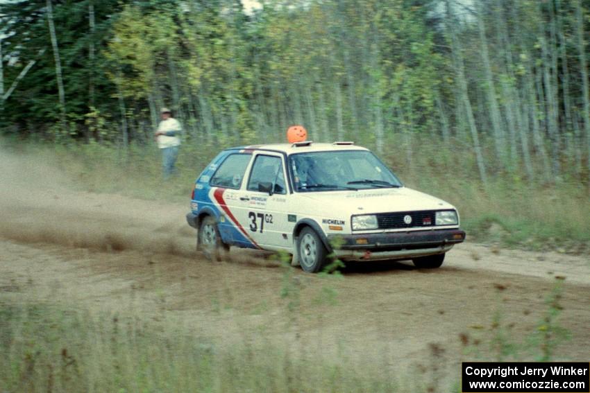 Eric Burmeister / Mark Buskirk come down the first straight on Menge Creek I in their VW GTI.