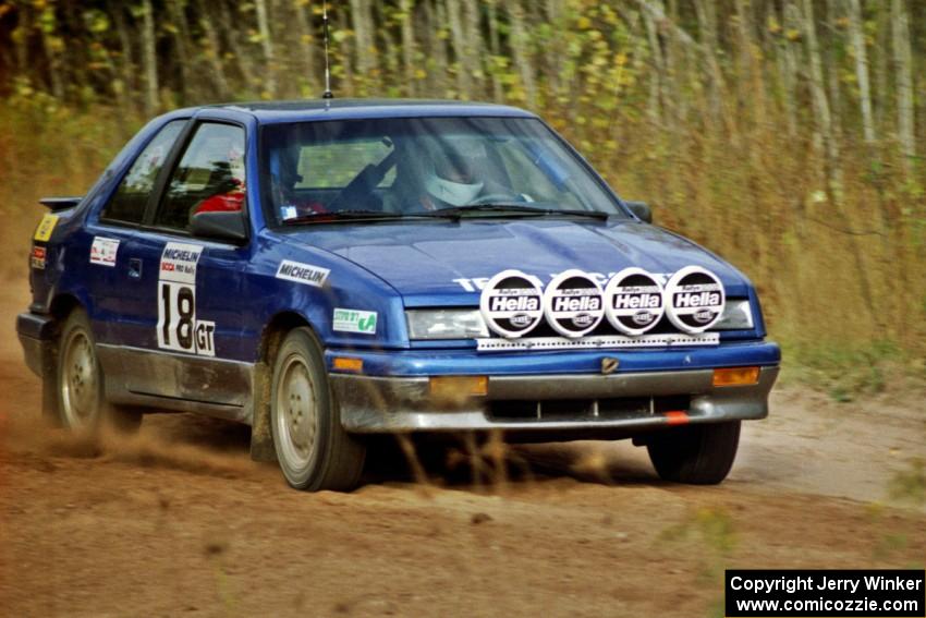 Kendall Russell / Catherine Roso drive their Dodge Shadow away from the start of Menge Creek I.