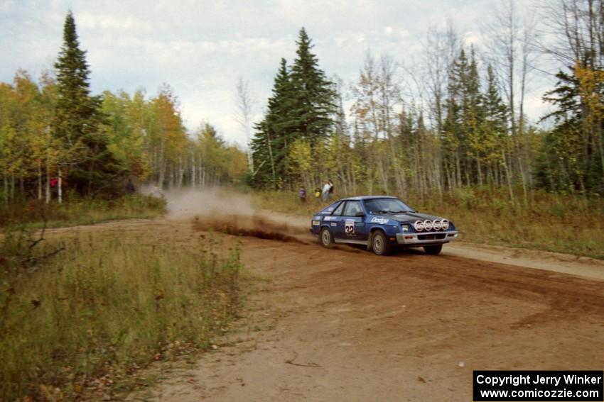 The Brian Scott / David Watts Dodge Shelby Charger drifts through the first corner of Menge Creek I at speed.