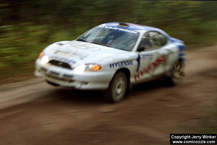 Paul Choiniere / Tom Grimshaw caught a little air at the culvert near the end of Menge Creek II in their Hyundai Tiburon.