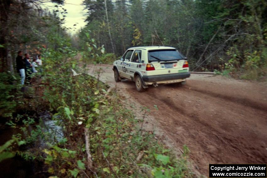 Wayne Prochaska / Annette Prochaska bring their VW Golf across the final bridge over Menge Creek on Menge Creek II.