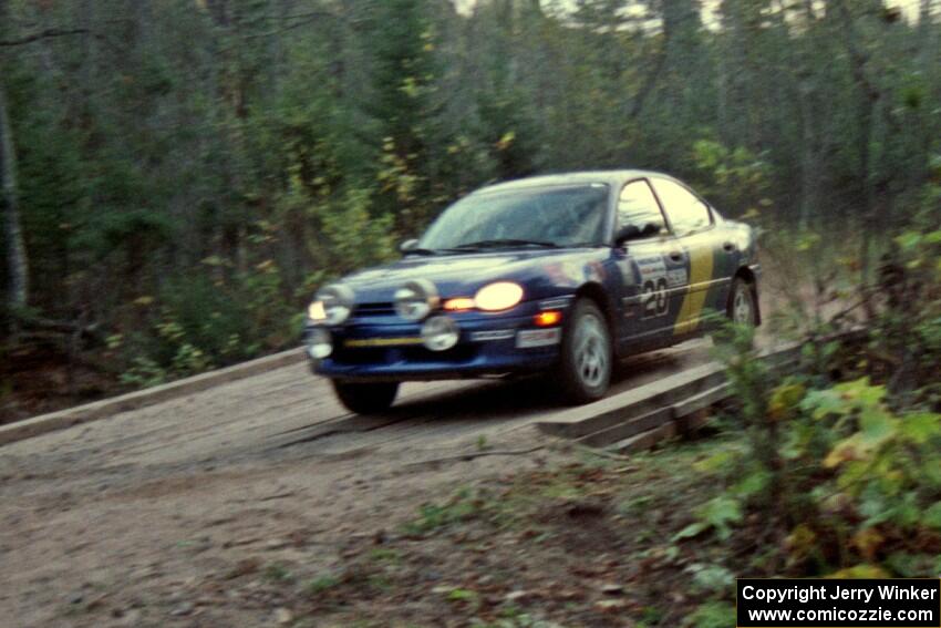 Al Kaumeheiwa / Craig Sobczak cross the final bridge of Menge Creek II in their Dodge Neon.