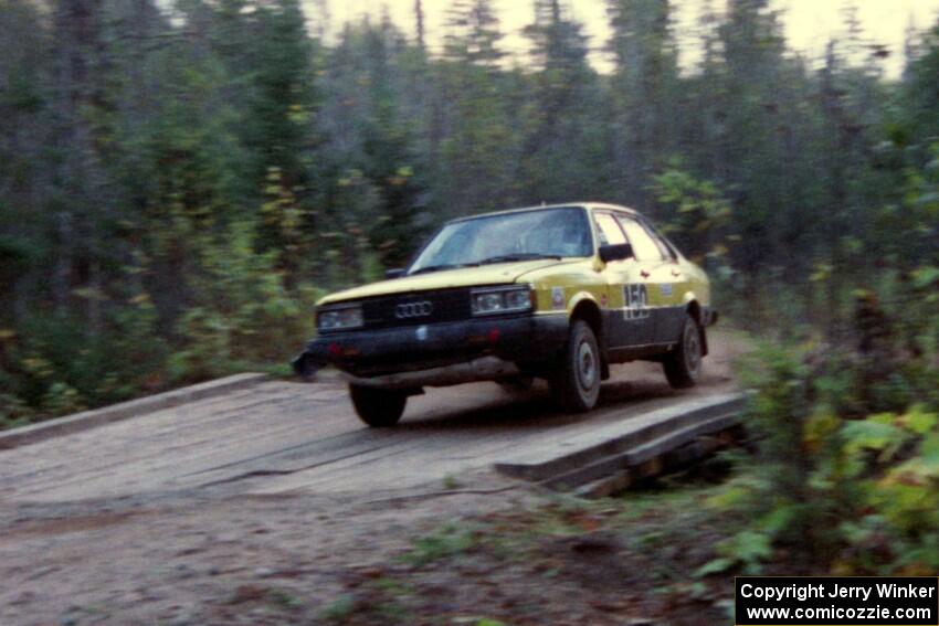 Mike Bodnar / D.J. Bodnar rockets across the final bridge of Menge Creek II in their Audi 4000S Quattro.