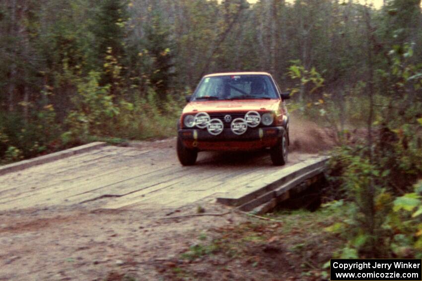 Doug Davenport / Al Kintigh drift their VW GTI across the final bridge of Menge Creek II.