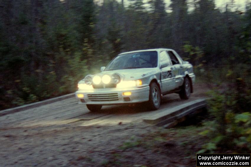 Bill Driegert / Hishin Shim sport fresh damage to the left-side of their Mitsubishi Galant VR-4.