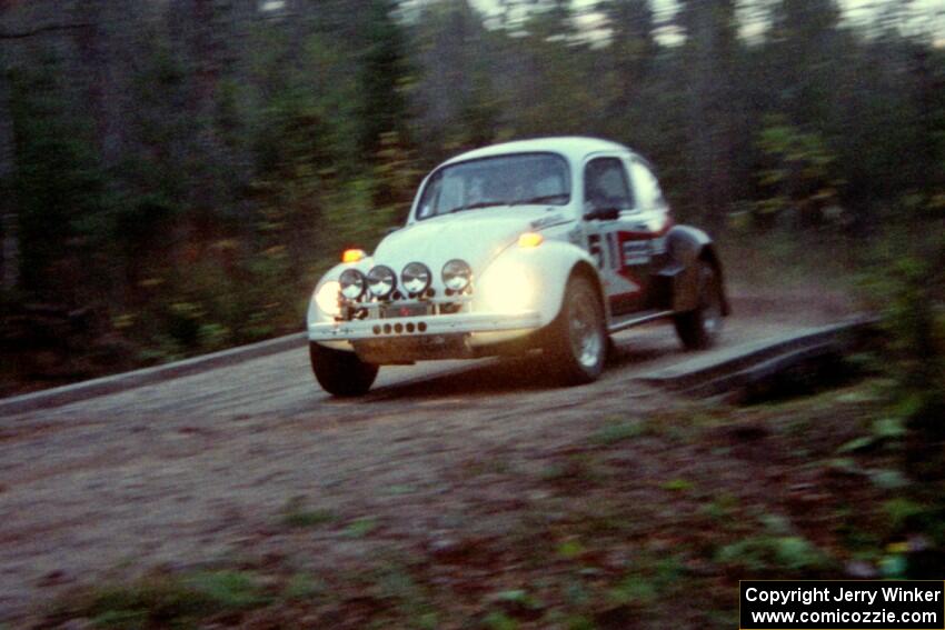 Mike Villemure / Reny Villemure drift their VW Beetle across the last bridge on Menge Creek II.