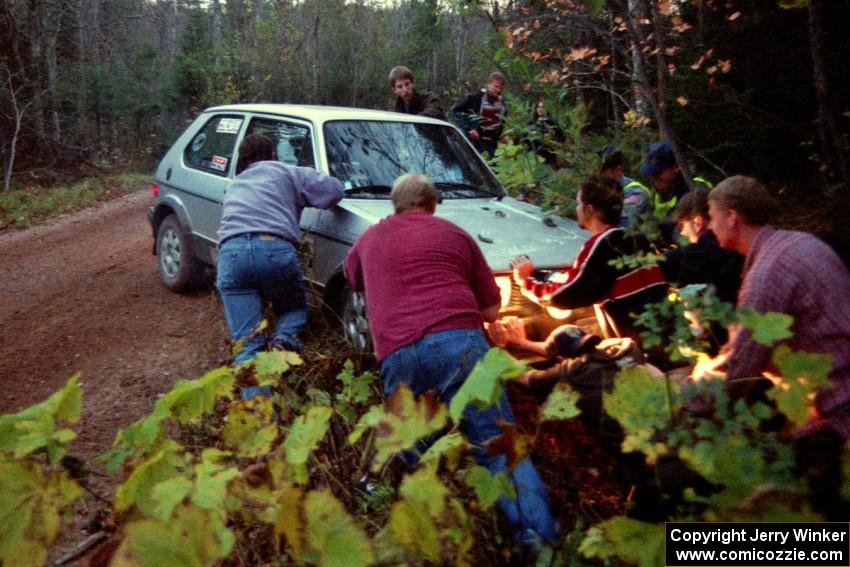 The Brett Corneliusen / Brenda Corneliusen VW GTI is pushed onto the road just just after the final bridge on Menge Creek II.