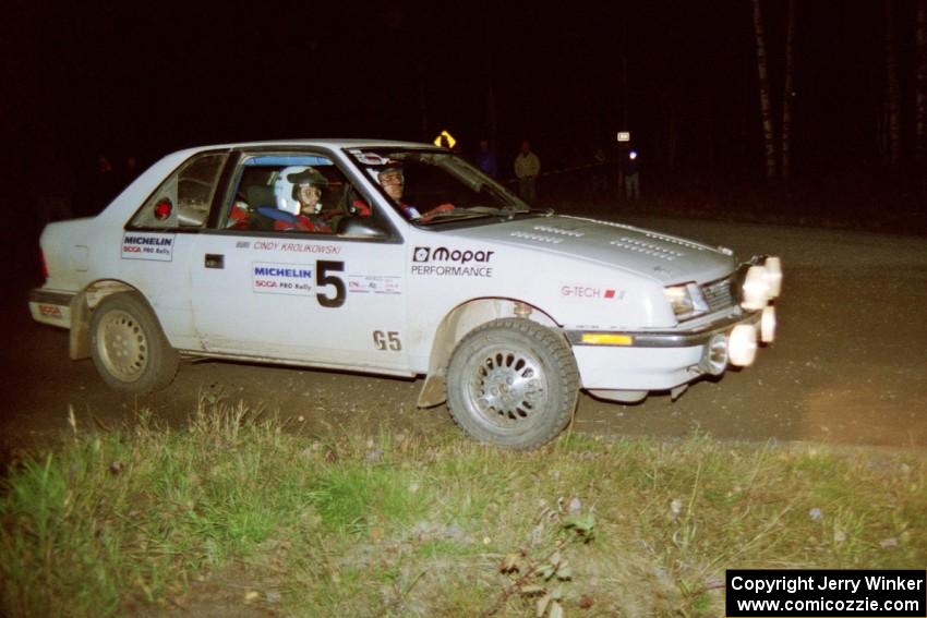 The Henry Krolikowski / Cindy Krolikowski Dodge Shadow sets up for a 90-right late at night.