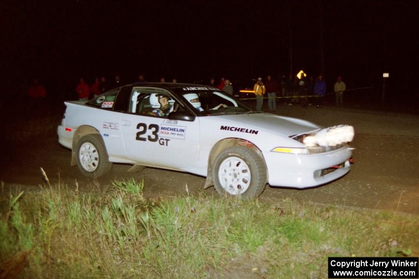 Chris Czyzio / Eric Carlson are set up for a 90-right at night in their Mitsubishi Eclipse GSX.