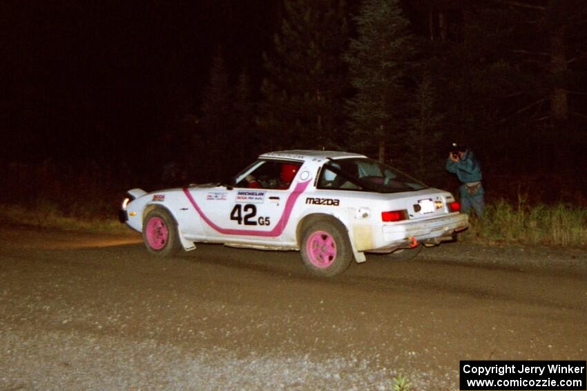Craig Kazmierczak / Diane Sargent drift their Mazda RX-7 through a 90-right at night.