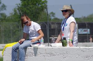 Corner workers at turn 6 take a lunch during the race.