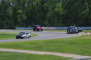 Three Sheets Ford Contour passes by as Team HACKcent Hyundai Accent gets a pull to re-start