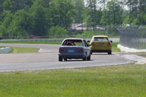 Team Short Bus VW Golf GL and North Loop Motorsports BMW 325