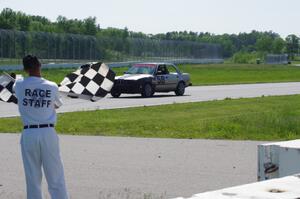 Speedlab BMW 325e takes the checkered flag