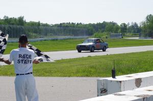 North Loop Motorsports BMW 325 takes the checkered flag