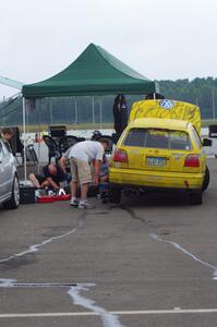 Team Short Bus VW Golf GL has an extended stay behind the pit wall for repairs