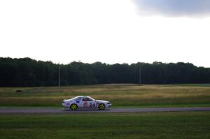 Bear Patrol Lexus SC400 comes into turn 4 about an hour before sundown