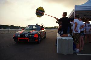 Tubby Butterman BMW 325 comes into the pits