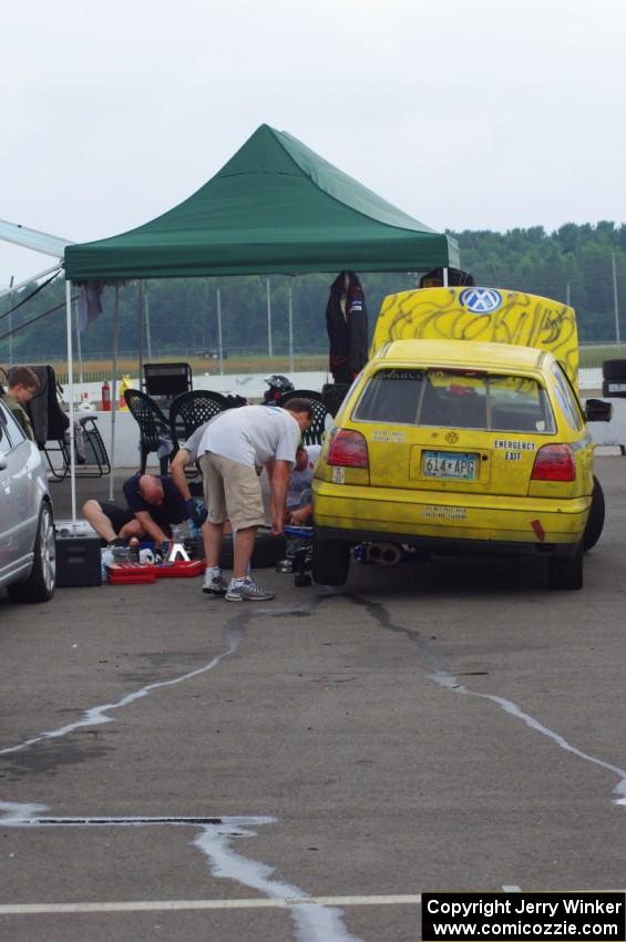 Team Short Bus VW Golf GL has an extended stay behind the pit wall for repairs