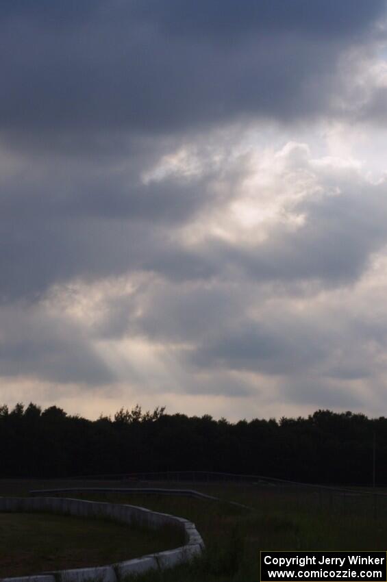 Corpuscular rays through the clouds above the track