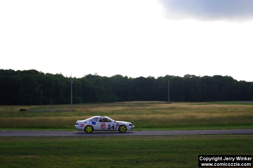 Bear Patrol Lexus SC400 comes into turn 4 about an hour before sundown