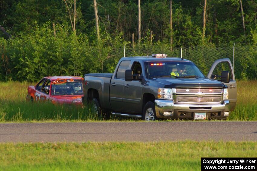 Trump Chump Honda Prelude gets pulled back onto the track after going off at turn 2