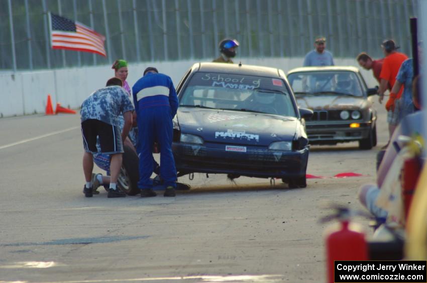 Mayhem Racing Honda Civic and North Loop Motorsports 2 BMW 325 in the pits