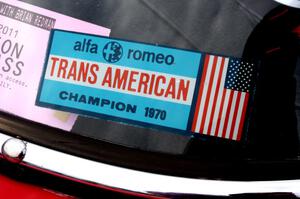 Old Trans-Am 2.5 Challenge sticker on the windshield of an Alfa-Romeo GTA