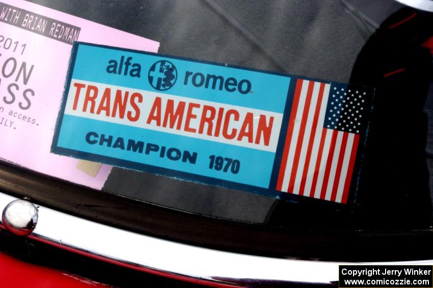 Old Trans-Am 2.5 Challenge sticker on the windshield of an Alfa-Romeo GTA