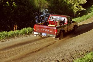 Scott Carlborn / Dale Dewald drift their Jeep Cherokee slightly while at speed just after the crossroads crest.