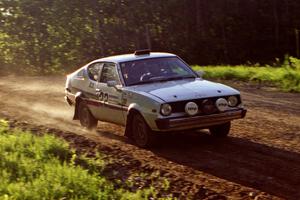 Jeremy Butts / Peter Jacobs at speed in their Plymouth Arrow at the crossroads crest.