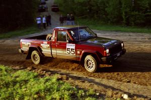 Scott Carlborn / Dale Dewald drift their Jeep Cherokee at the crossroads spectator location.